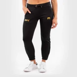 Venum Women's UFC Authentic Fight Night Walkout Sweatpants - Black/Gold -Modish Ink Sales GUEST 8e22173c 38fe 4a7d 8424 71178719202b